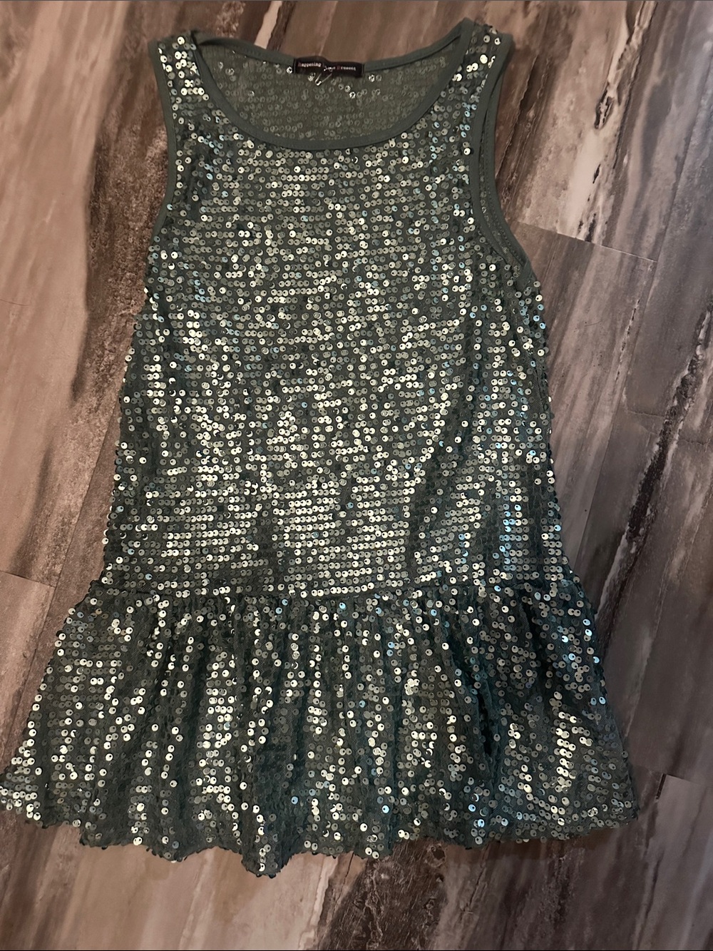 happening in the present Sequin Shell Top - Teal Green